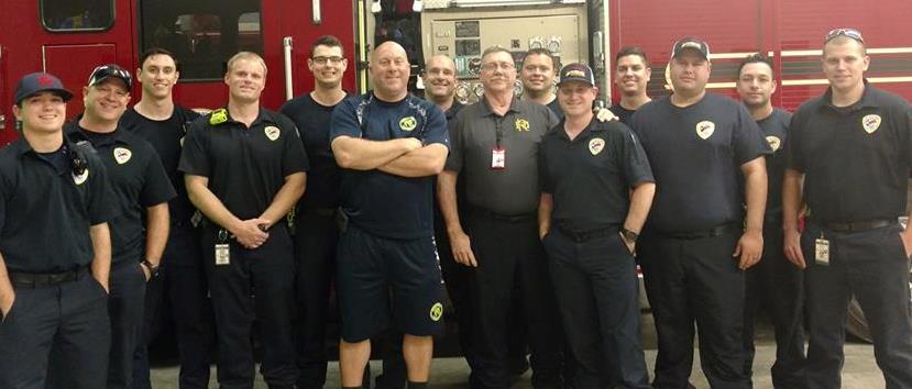 Tom Walleck and firefighters at his retirement