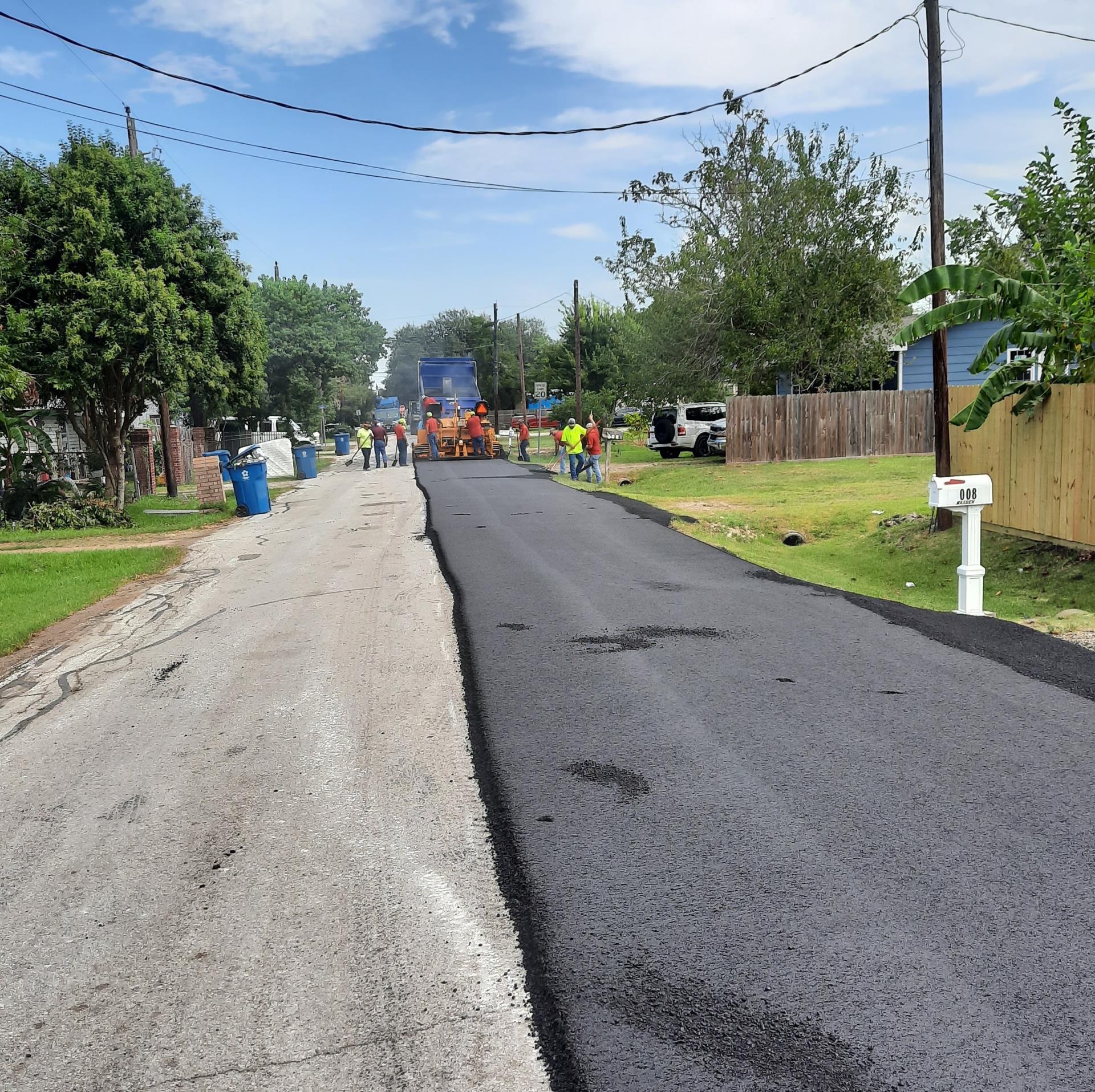 Center St asphalt overlay collab with county