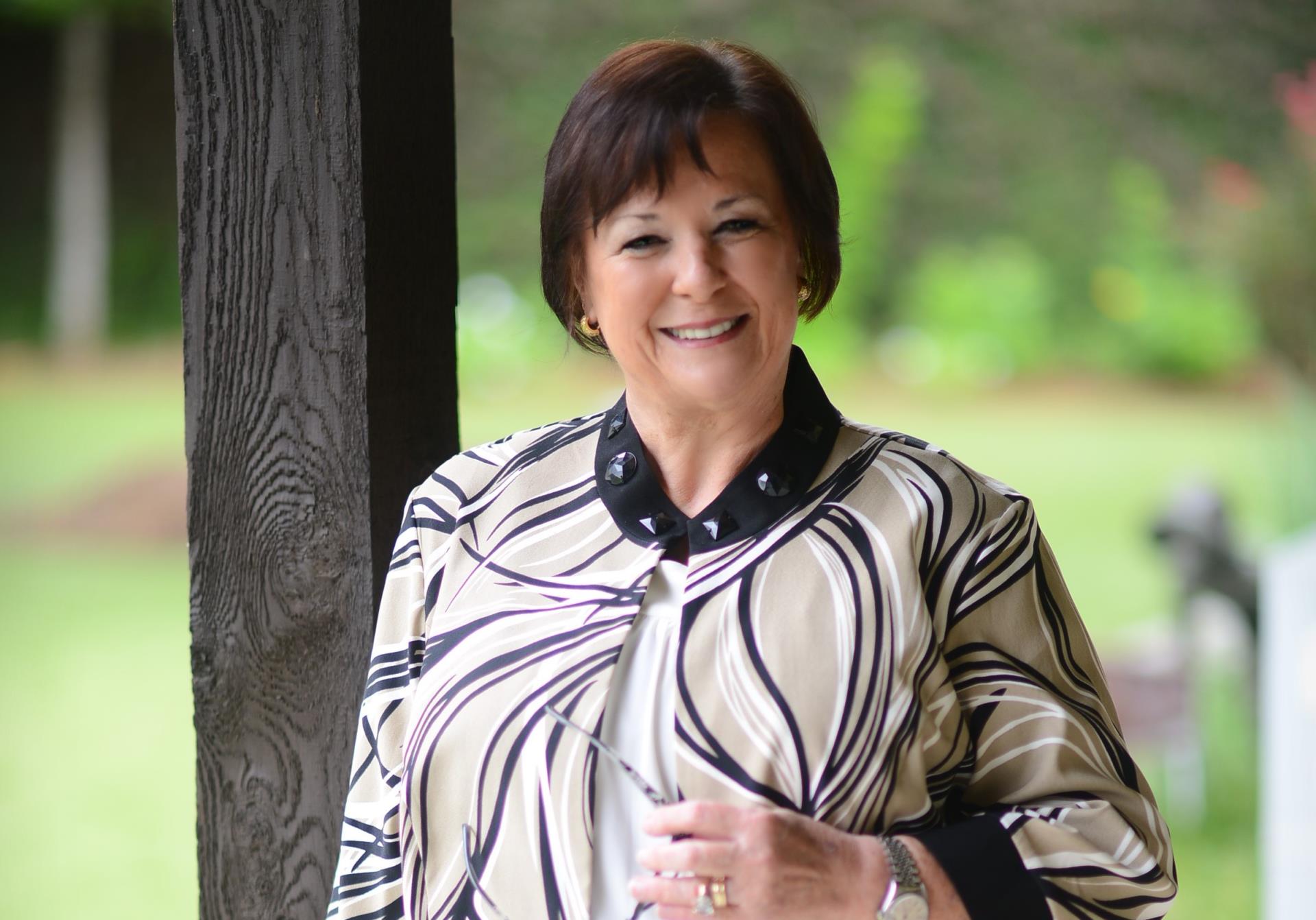 Mayor Becky Haas on Long Acre Ranch porch