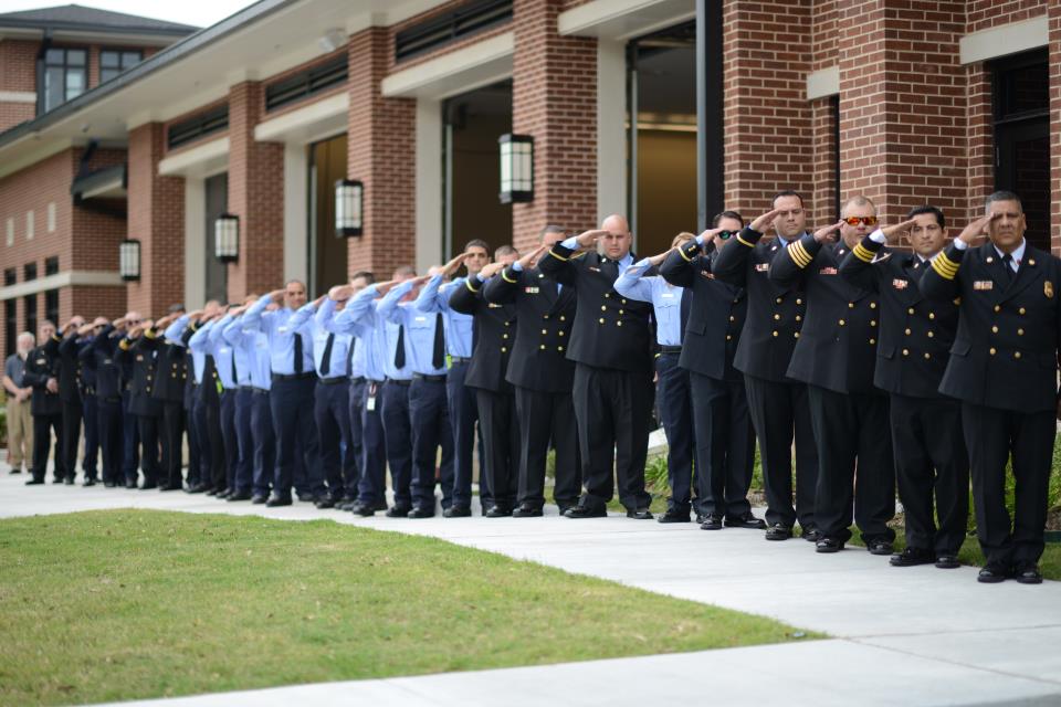 Fire men at attention and salute