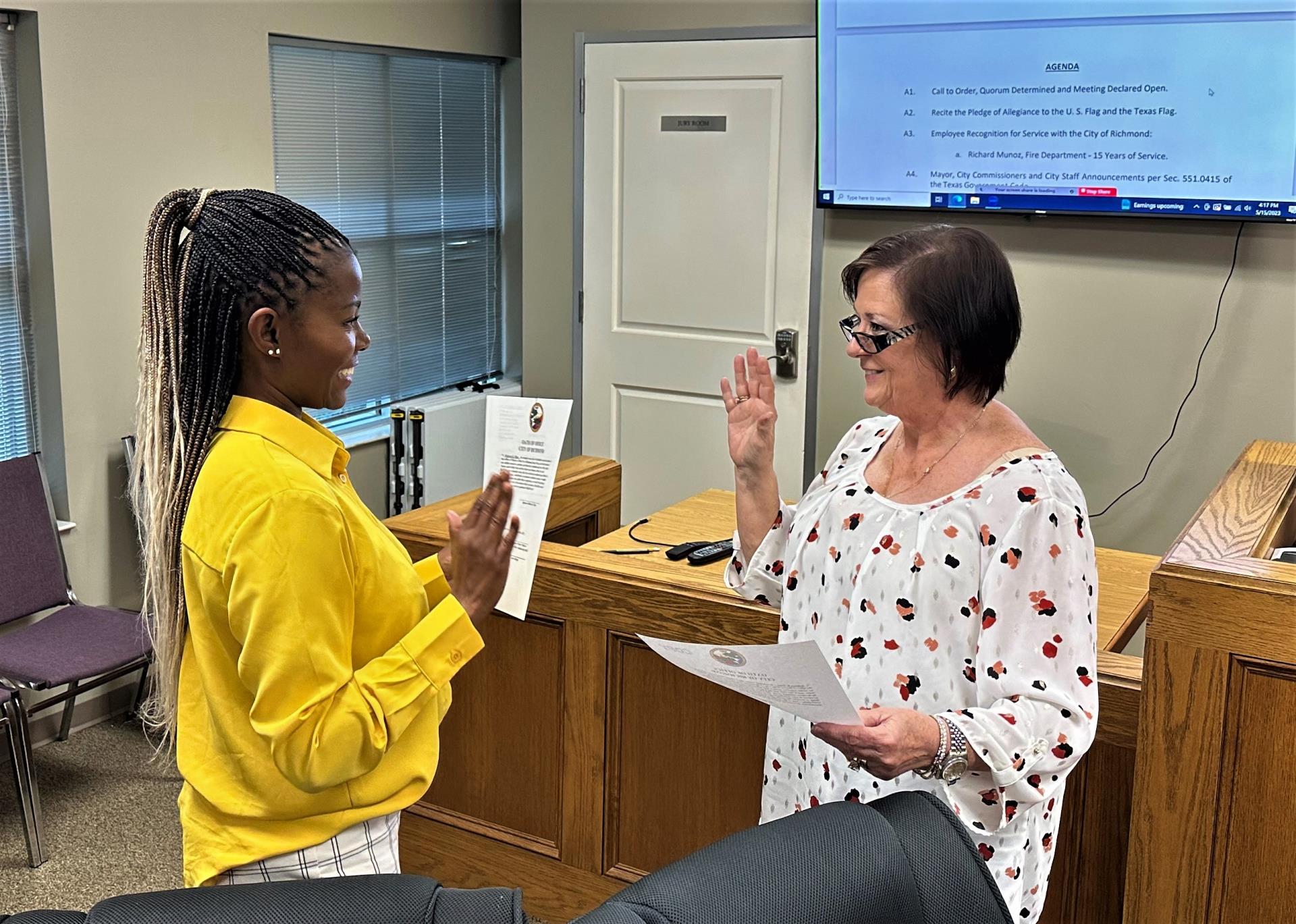 City Secretary Lasha Gillespie swearing in Mayor Becky Haas May 15, 2023