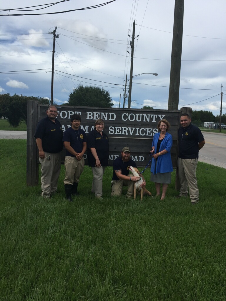 Mayor Moore with dog FT Bend County Animal Services